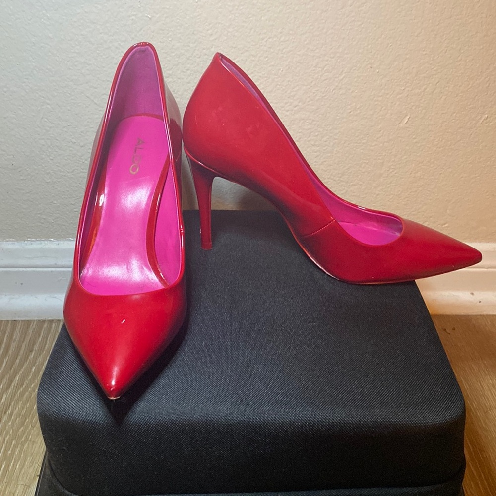 Red ALDO heels only worn twice. Minor scuff mark on left heel.